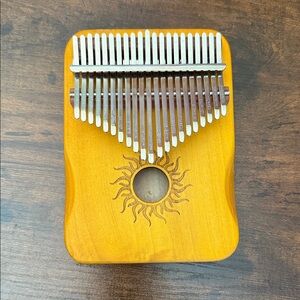 Hand Crafted Sunburst Kalimba in Natural Wood 5” x 7”